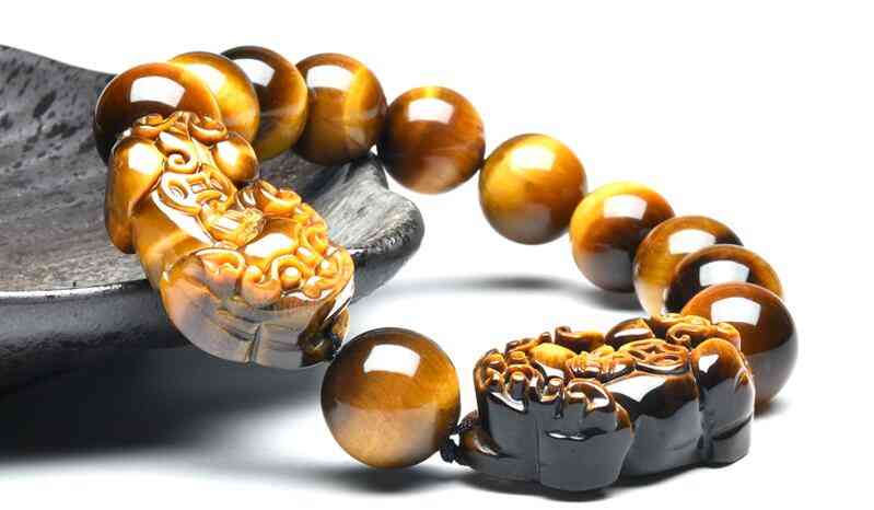 黄虎眼石的功效与作用(黄虎眼石的功效与作用禁忌)