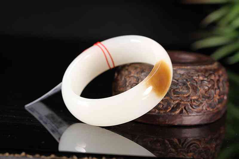 玉手镯裂纹补救最好办法(手镯里面有裂纹儿是纯天然的吗)插图2