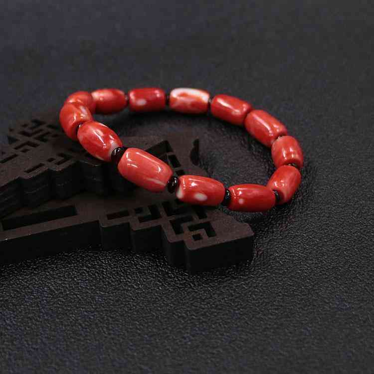 红珊瑚手链对身体有什么好处(红珊瑚真品放在水里会怎样)