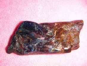 虎睛石价格(虎睛石摆件极品拍卖价格)