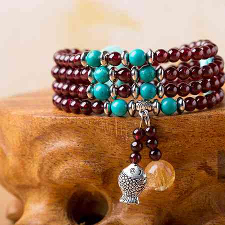 石榴石手链有什么功效(石榴石手链有什么功效和作用)