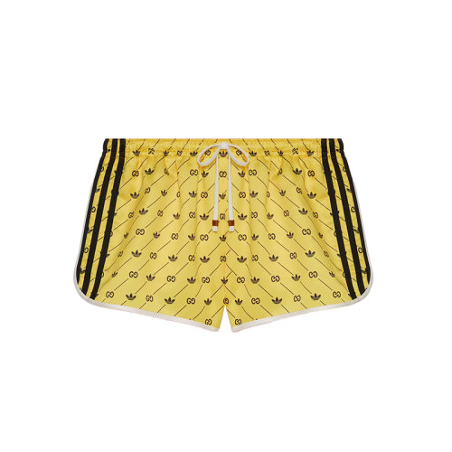  GUCCI/古驰 22年秋冬新款 adidas联名系列 女士黄色/黑色聚酯纤维老花斜纹印花短裤693439XJEGV1131