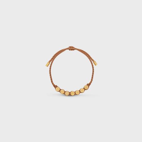 CELINE赛琳思琳 22年秋冬 女士 手镯 CELINE PLAGE金色饰面黄铜和聚酯纤维波点手镯 46Z932BPO.