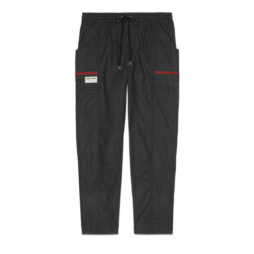  GUCCI古驰 22年秋冬 男士 饰Gucci标签涂层棉布长裤 604171 XDBCH 1043